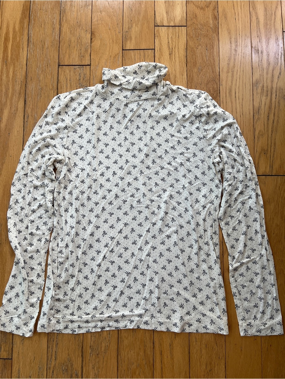 LOFT Cream Turtleneck with Black bow Motif